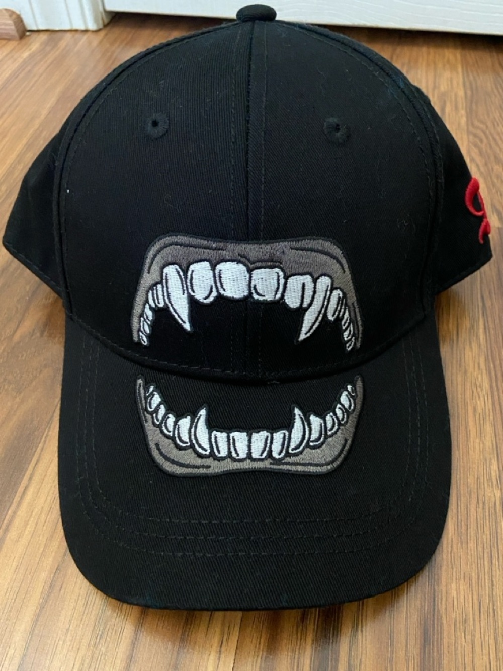 Universal Orlando Epic Universe Dark Universe Dracula fangs black SnapBack hat